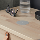Image for article titled This Stick-On Gadget Solves Wireless Charging's Biggest Problem